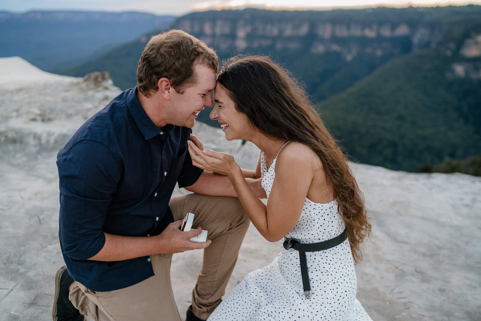 Couple together on a Blue Mountains clifftop